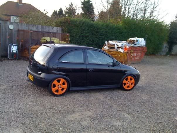seen a few corsa c sri's in black with lime green wheels before 